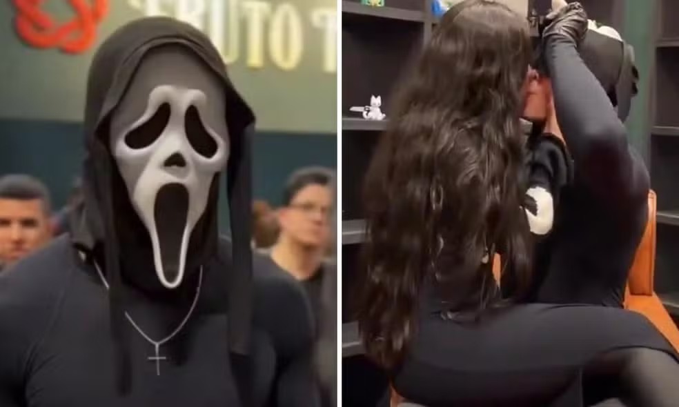 Mascarado recebe fila de leitoras na Bienal com beijos, tapas e até colo