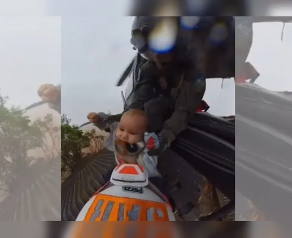 Impressionante: bebê é resgatado pelo telhado de casa no RS