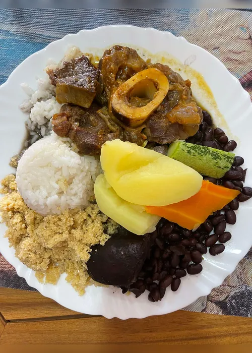 
			
				O Aconchego mora aqui — e é servido com pudim caramelizado
			
			