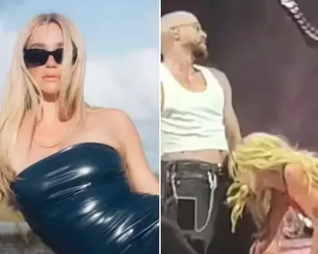 Cantora causa polêmica ao chupar banana em dançarino durante show