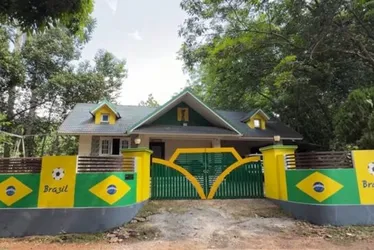 
				Na Índia, torcedor viraliza ao pintar a casa com as cores do Brasil
			
			